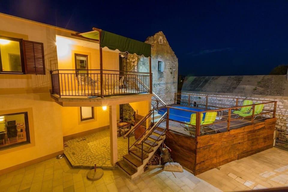 Front of property - evening/night