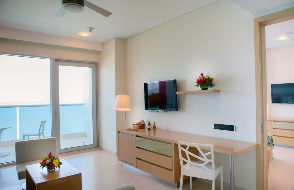 Junior Suite, 1 King Bed, Sea View | Premium bedding, minibar, in-room safe, desk