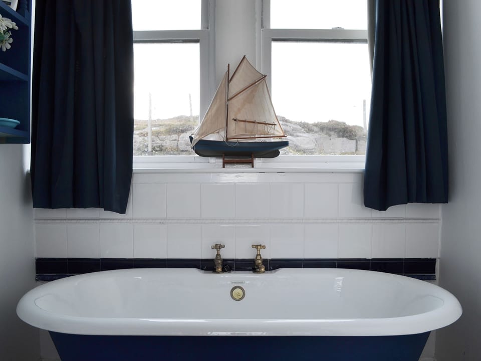 Charming bathroom with rolltop bath | Vindolanda, Fearnbeg, near Applecross