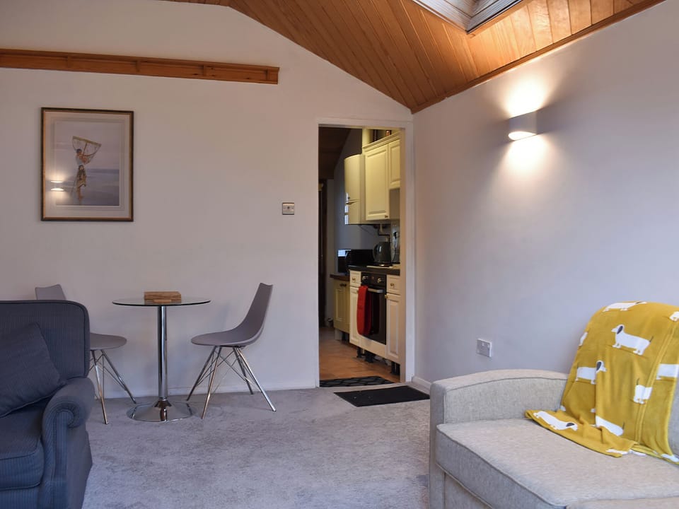 Modest dining area in the living room | The Cottage By The Sea Annexe - The Cottages by the Sea, Littlehampton, near Arundel