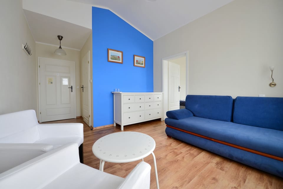 Family Apartment (2 rooms) | Living area | 32-inch flat-screen TV with digital channels