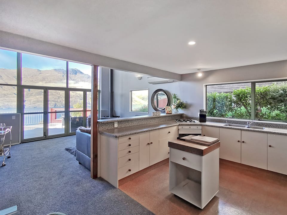 Private 3 Bedroom Duplex | Private kitchen | Full-size fridge, microwave, oven, stovetop