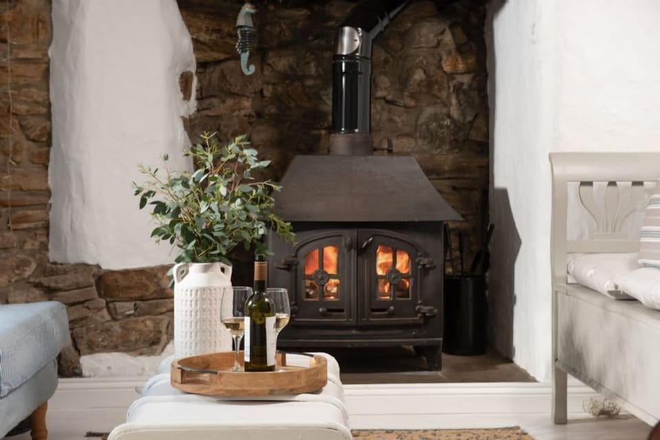 Roseneath, St Agnes. Ground floor: Snug with cosy wood burning stove