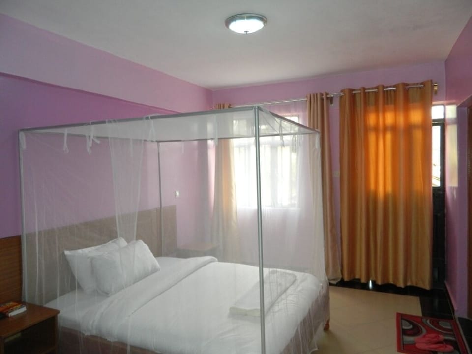 Premium bedding, memory foam beds, desk, laptop workspace