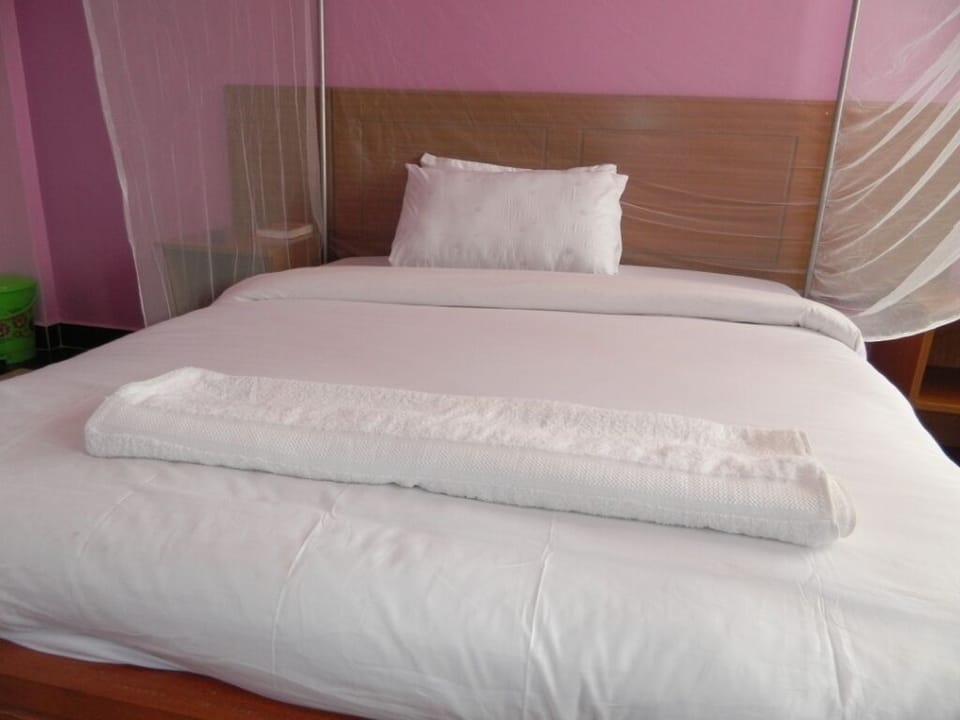 Premium bedding, memory foam beds, desk, laptop workspace