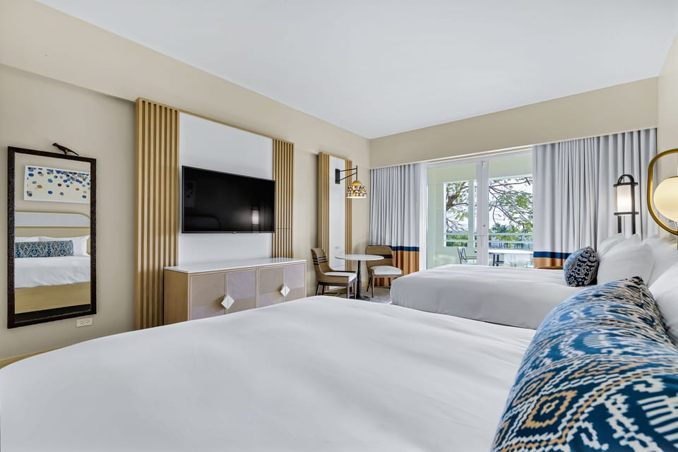 Deluxe Room, 2 Queen Beds, Marina View | Hypo-allergenic bedding, in-room safe, desk, laptop workspace