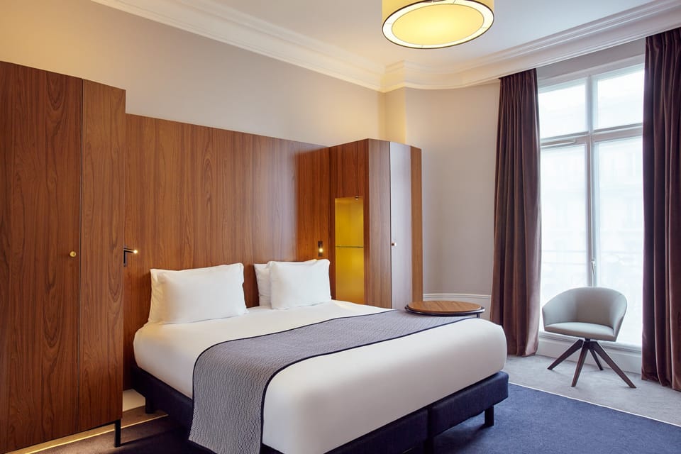 Hypo-allergenic bedding, free minibar, in-room safe, desk