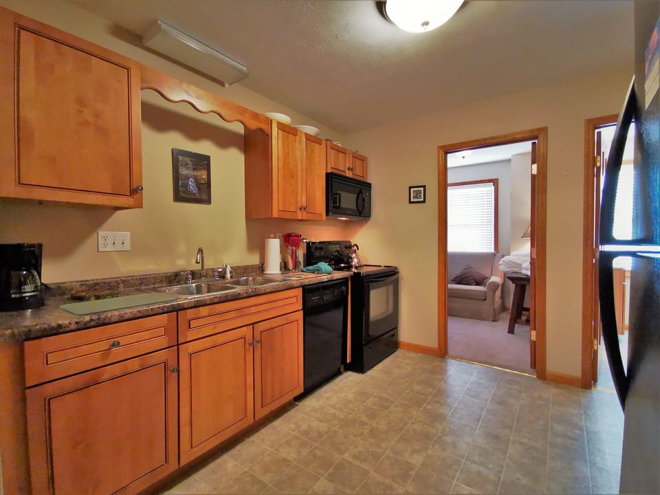 Full kitchen stocked with cooking ware ,utensils and more