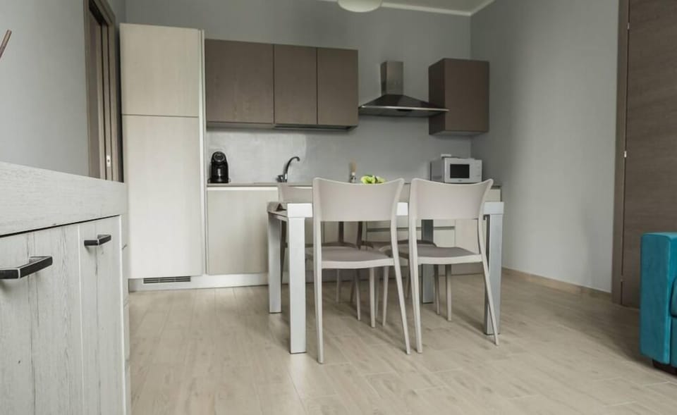 Apartment, 1 Bedroom (Magna) | Private kitchenette | Full-size fridge, microwave, stovetop, dishwasher