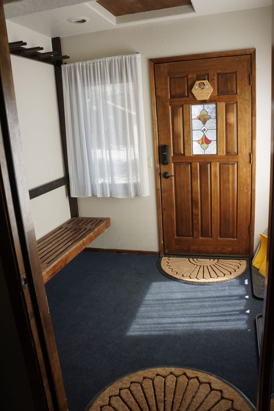 Mudroom looking from downstairs hall to front door. Great place for gear. 