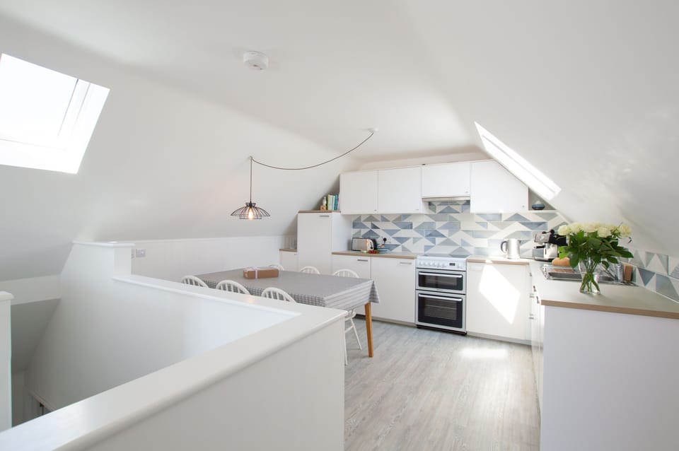 Sunfish, Porthtowan. First floor: Kitchen and dining area