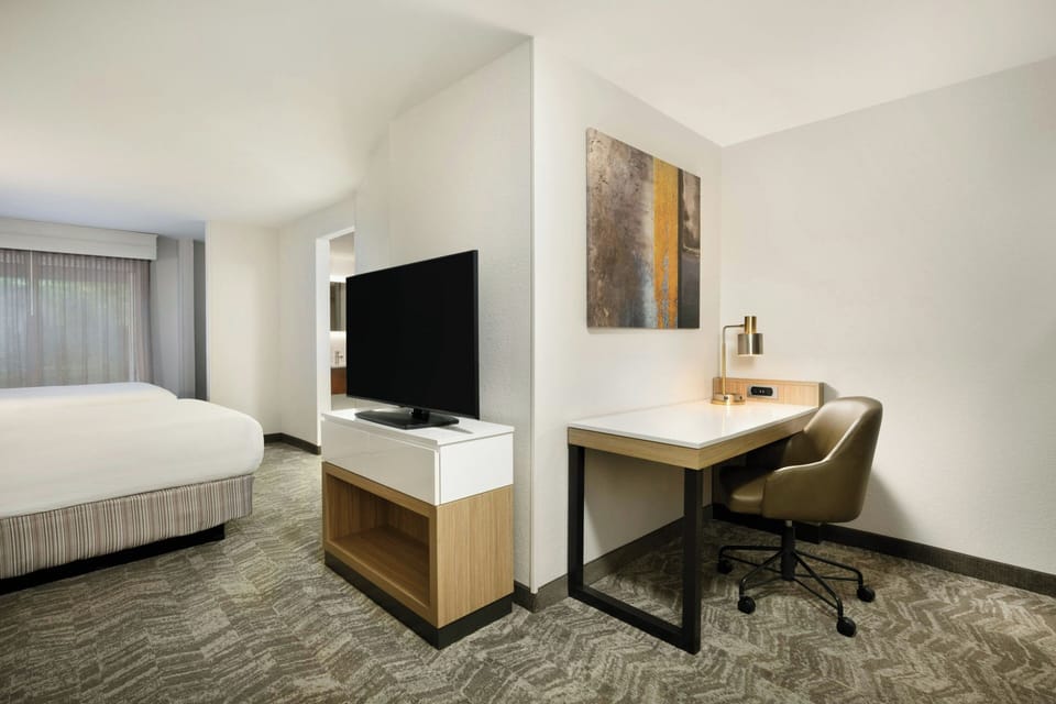 Premium bedding, pillowtop beds, desk, laptop workspace