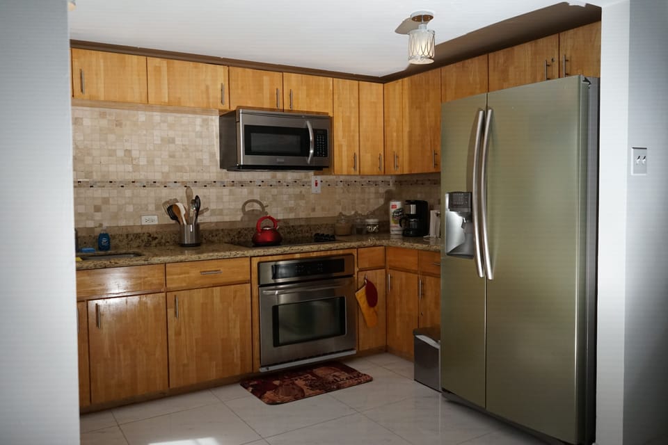 Refrigerator with ice maker and filtered water