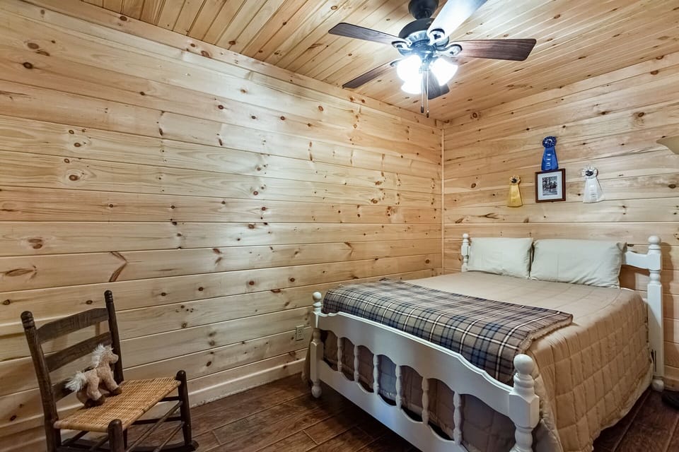 The lower level bedroom has a full size bed.