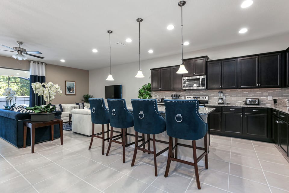 Classy barstool seating facing the kitchen