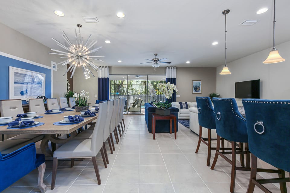 View 2 of spacious living room and kitchen area with comfortable seating