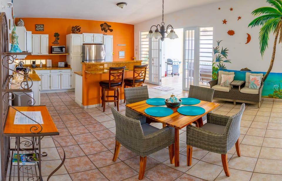 Superior Villa, 2 Bedrooms, Balcony, Oceanfront | Private kitchen | Highchair, dining tables