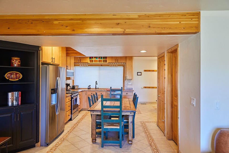 Modern, open kitchen with communal table!