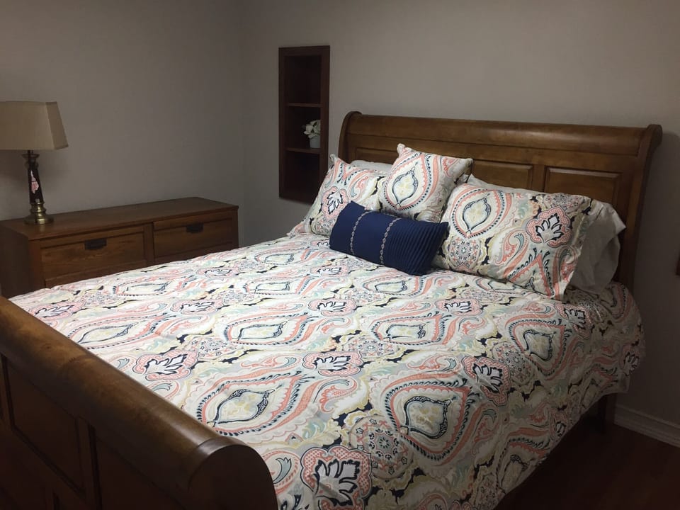 Second downstairs bedroom with queen bed.