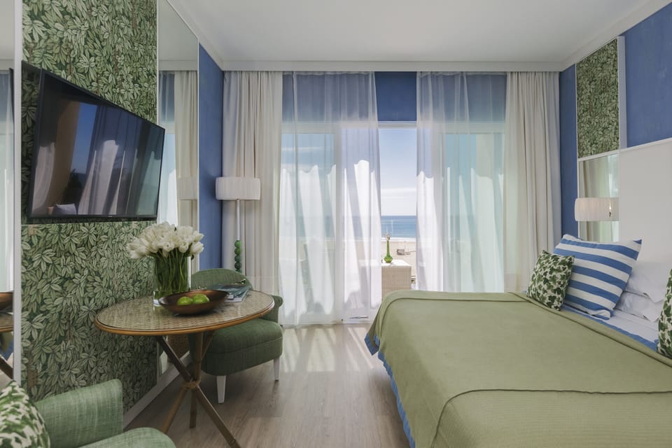 Deluxe Room, Balcony, Sea View | Select Comfort beds, minibar, in-room safe, individually decorated
