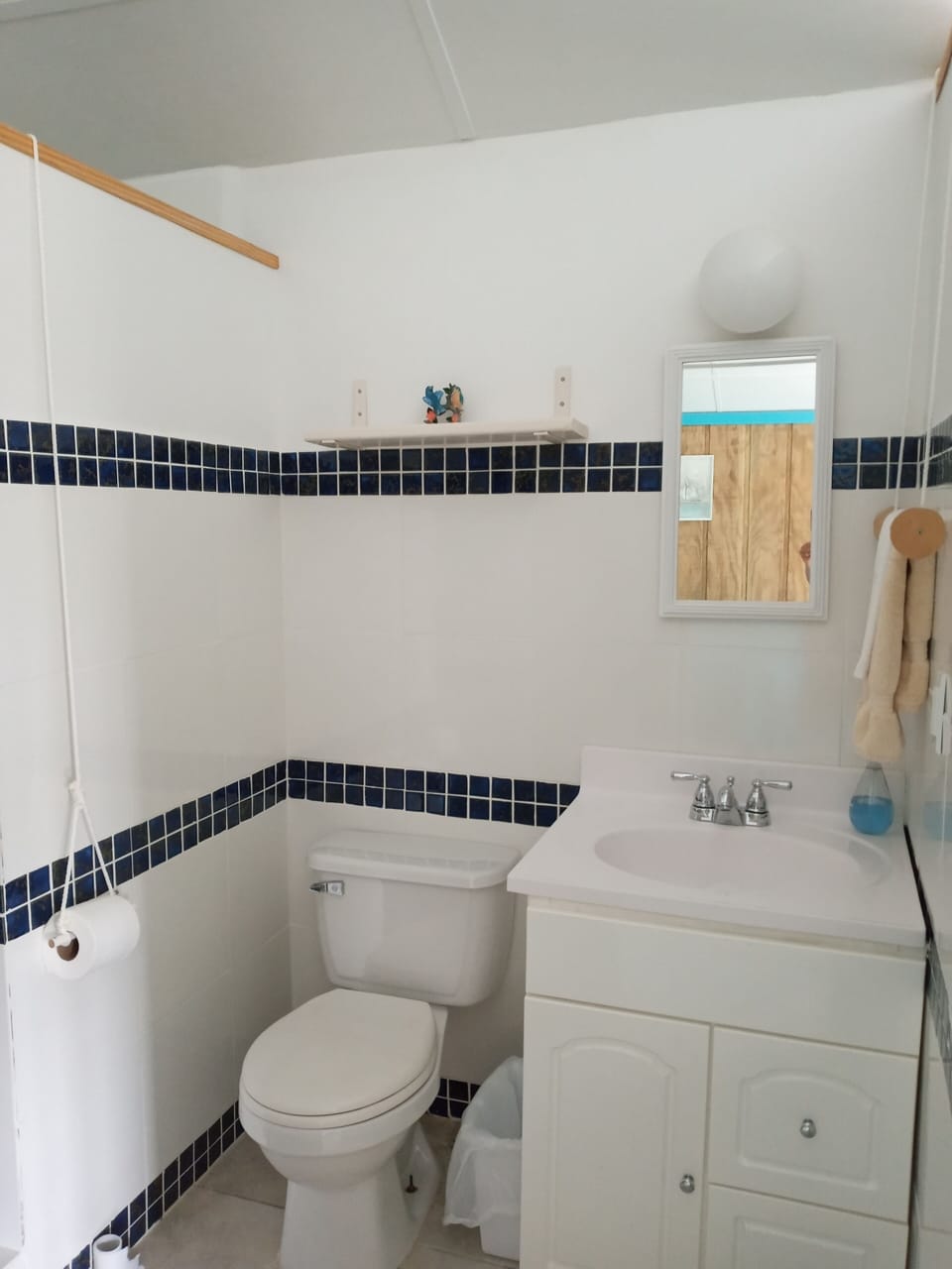 Tiled bathroom with walk in shower
