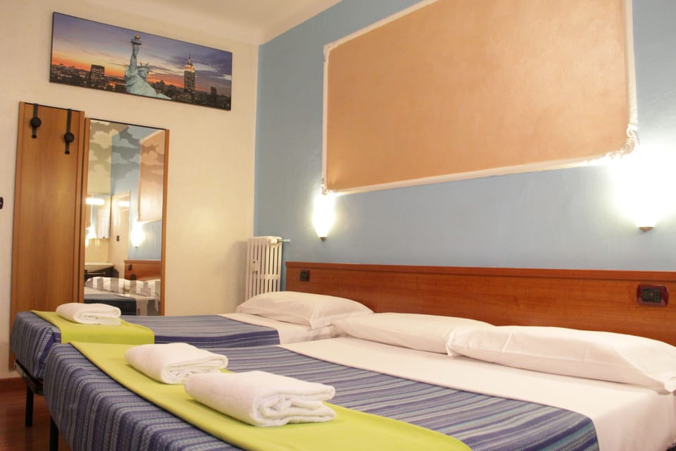 Standard Triple Room, Shared Bathroom | Premium bedding, Select Comfort beds, minibar, in-room safe