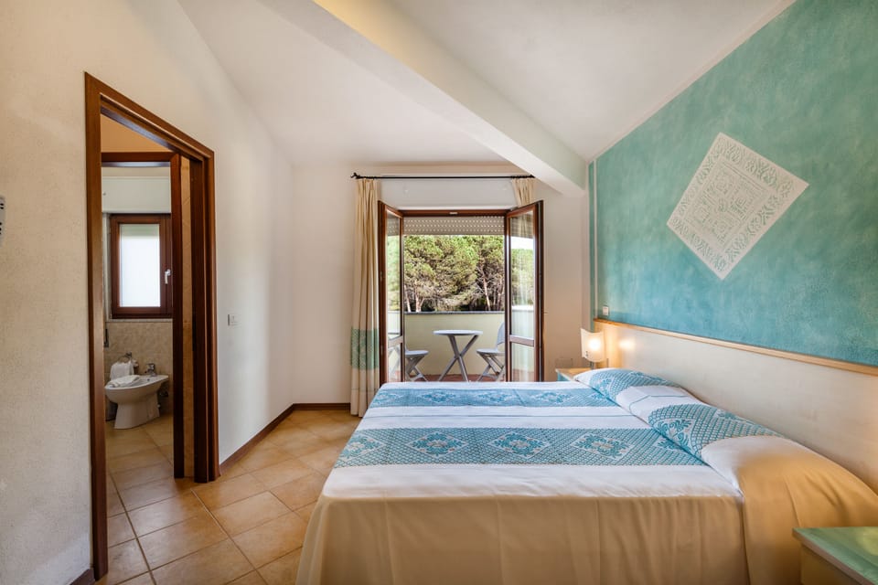 Double Room, Terrace | Minibar, in-room safe, desk, cribs/infant beds