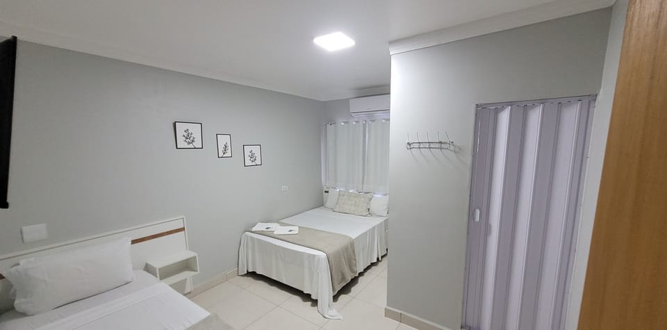 Triple Room | Hypo-allergenic bedding, iron/ironing board, free WiFi, bed sheets
