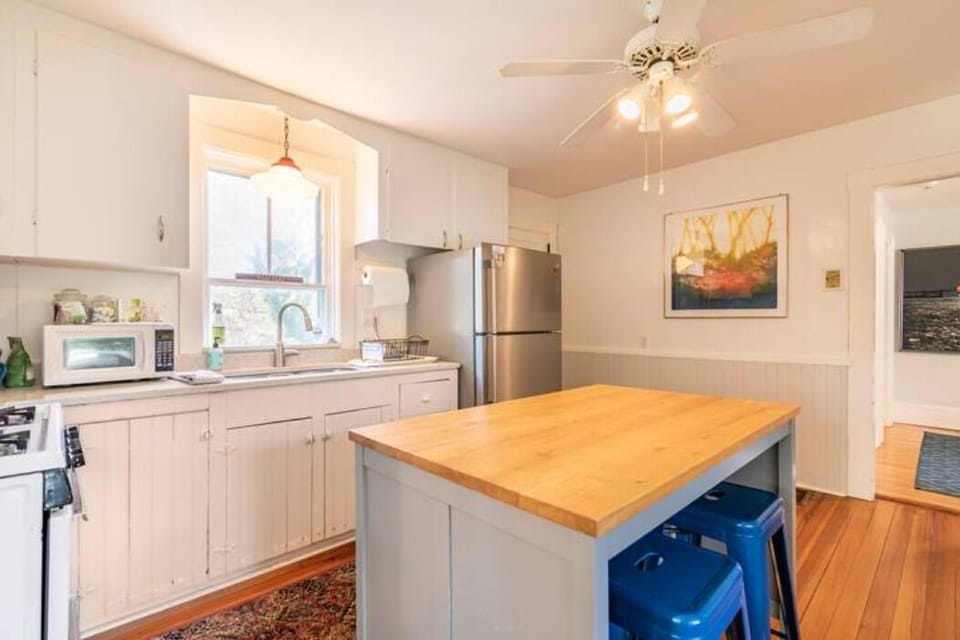 Fridge with ice maker. Full size appliances. Dinnerware and cookware included.