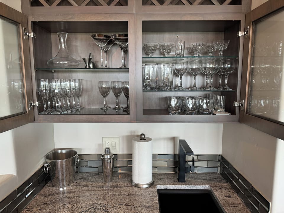Bar has full glass set for every cocktail need.