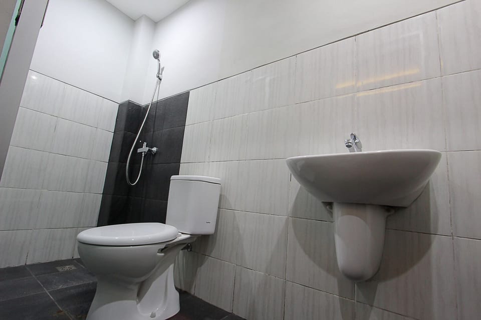 Shower, slippers, towels, soap