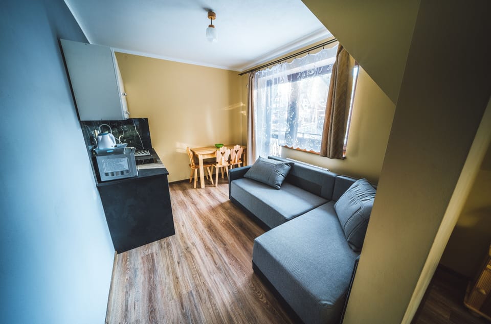Quadruple Room | Living area