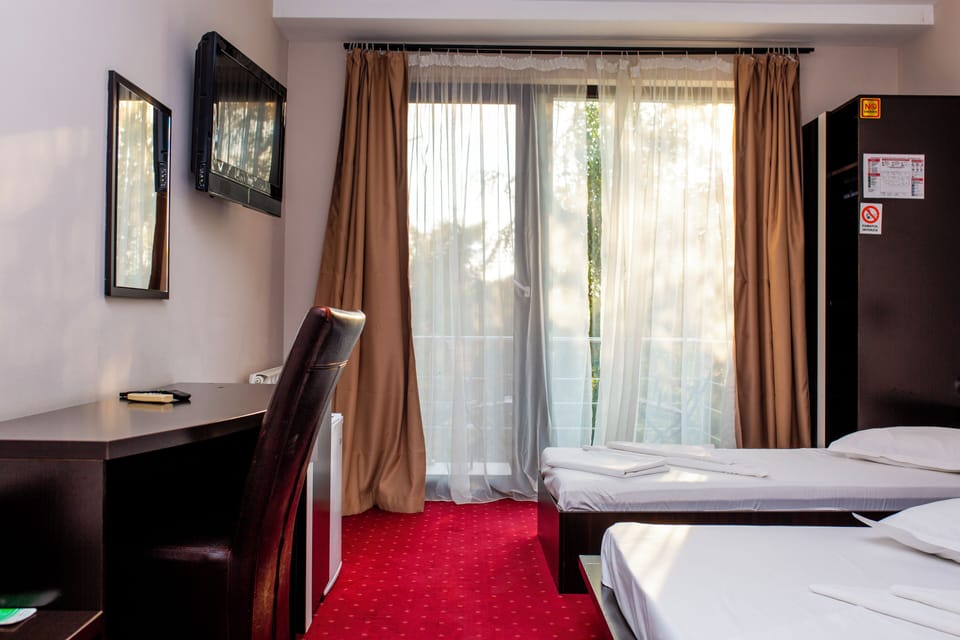 Standard Triple Room | Pillowtop beds, desk, blackout drapes, soundproofing