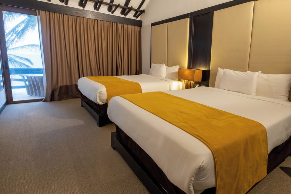 Deluxe Room, 1 King Bed, Sea View | In-room safe, desk, laptop workspace, blackout drapes