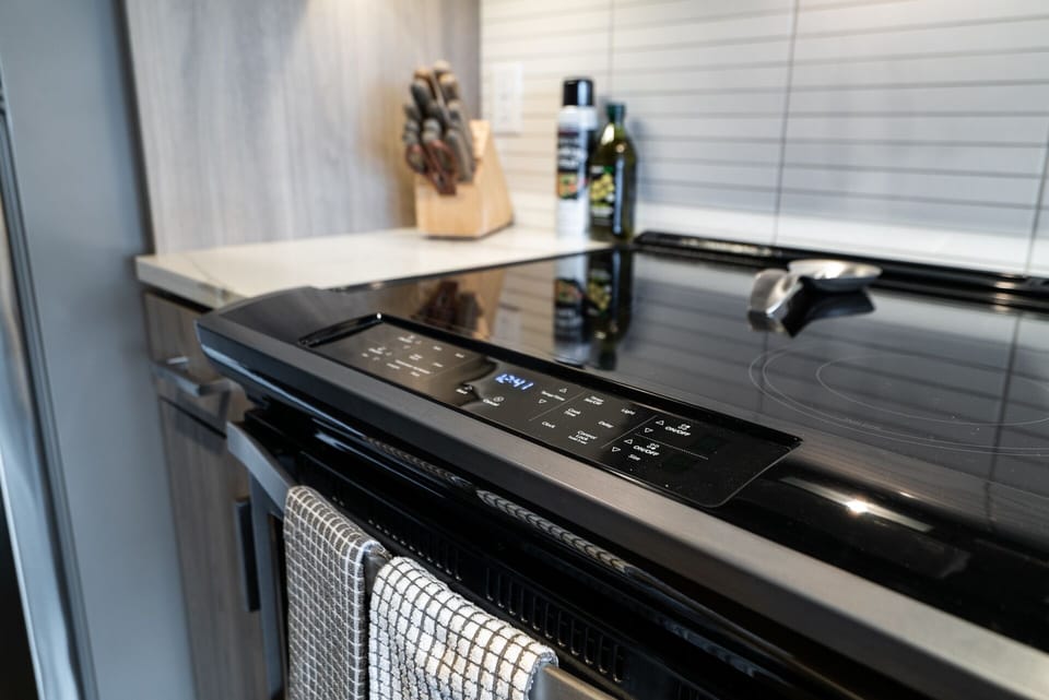 Stainless Appliances with flat top stove