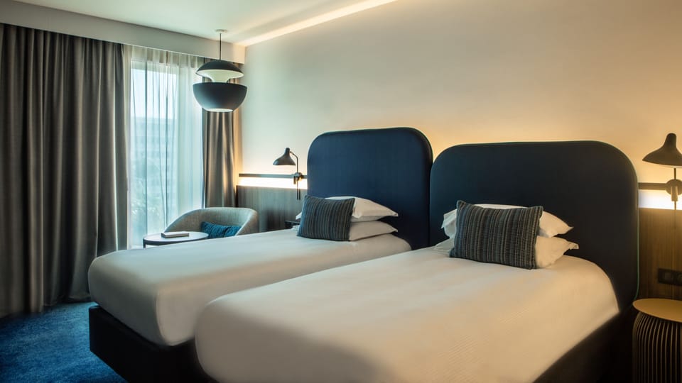 Premium bedding, pillowtop beds, minibar, in-room safe