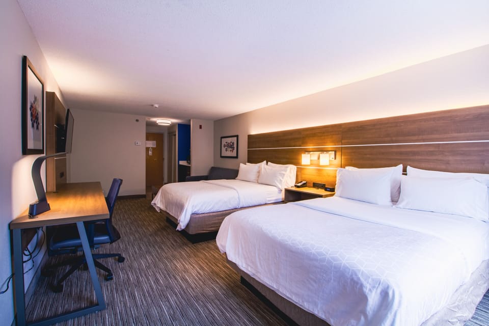 Suite, 2 Queen Beds | In-room safe, desk, laptop workspace, blackout drapes