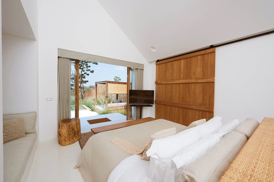 Premium bedding, down comforters, pillowtop beds, free minibar