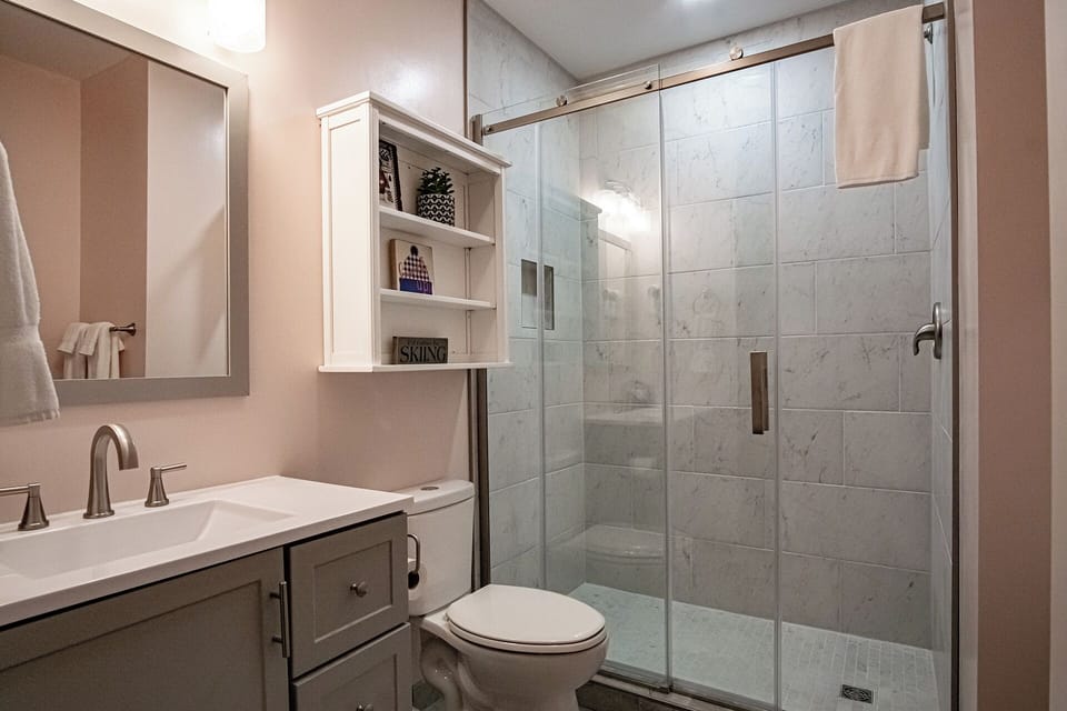 2024 Remodeled shared bathroom in the hallway; with heated floors!