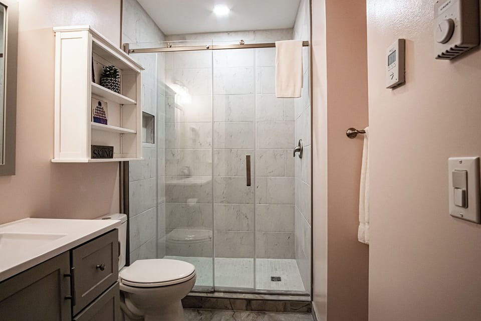2024 Remodeled shared bathroom in the hallway; with heated floors!