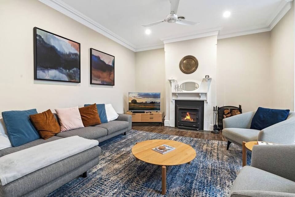 Living room with wood burner to relax and unwind after the day.
