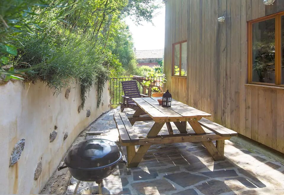 Large terrace with good shade from the summer sun with BBQ and picnic table