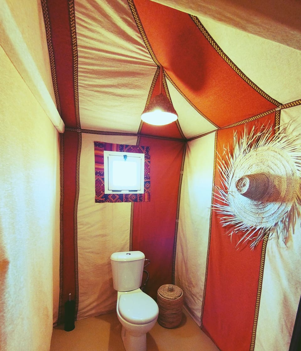 Luxury Tent | Bathroom | Shower, rainfall showerhead, designer toiletries