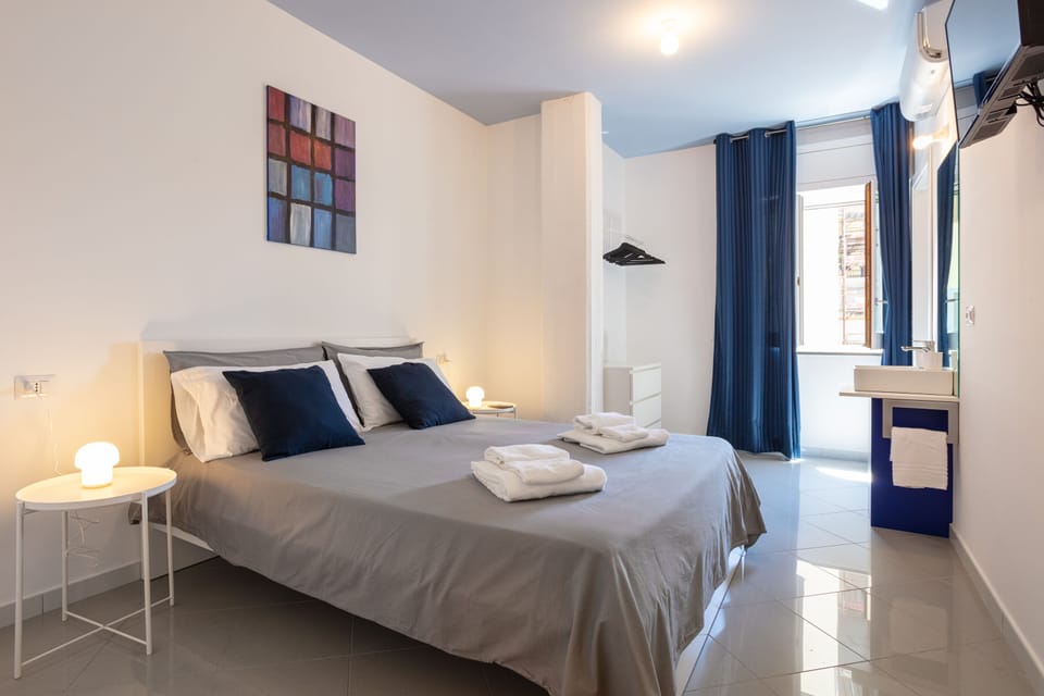 Room, City View (Room 05) | In-room safe, individually decorated, individually furnished, desk