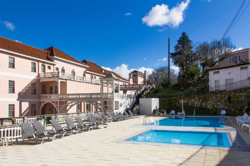 Seasonal outdoor pool, pool umbrellas, sun loungers