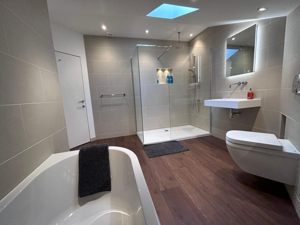 Bathroom with bath & large walk in shower