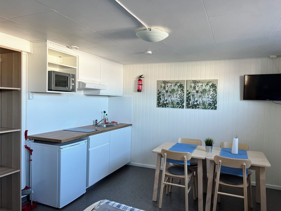 Quadruple Room, Private Bathroom | Living area