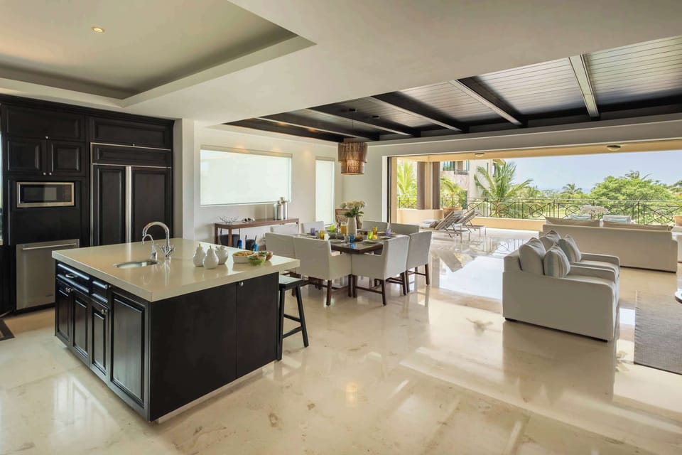Spacious open kitchen and living area, perfect for gathering with family and friends.
