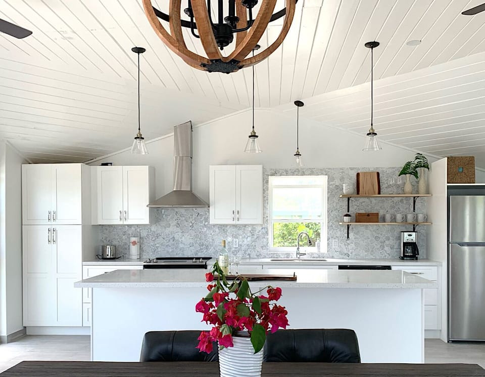Large open concept kitchen with 4 seater Island. Great for entertaining!