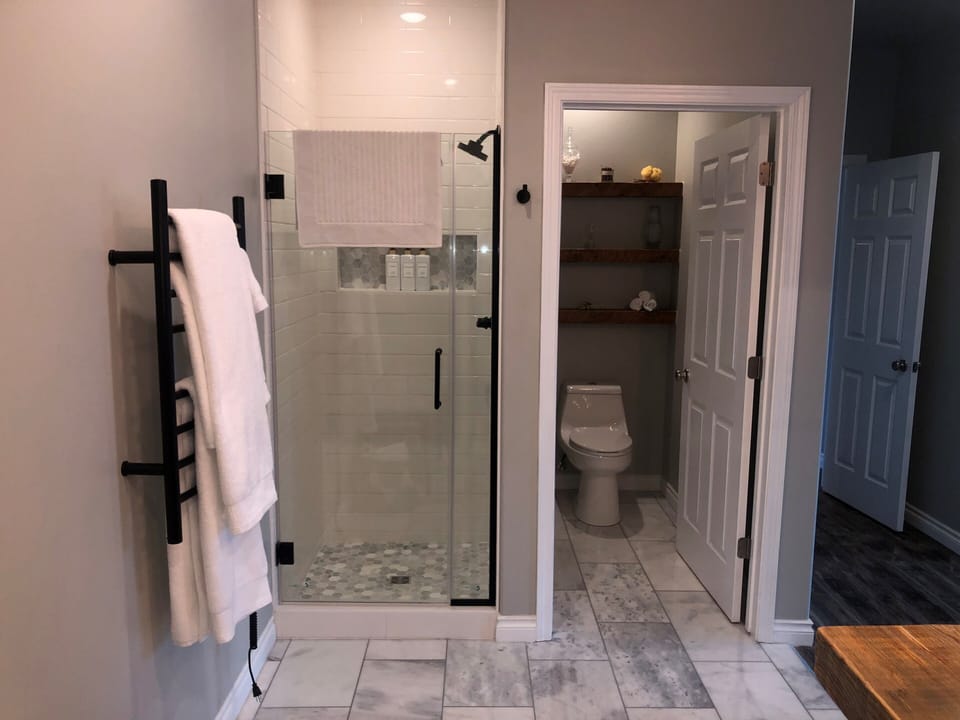 Master bath with towel warmer.
